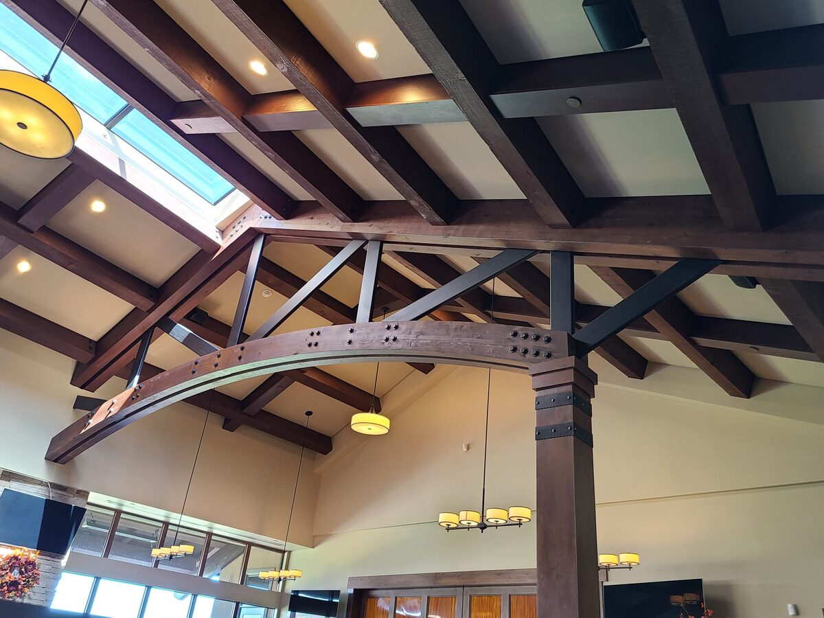 Curved glulam trusses fabricated by Lam-Wood Systems